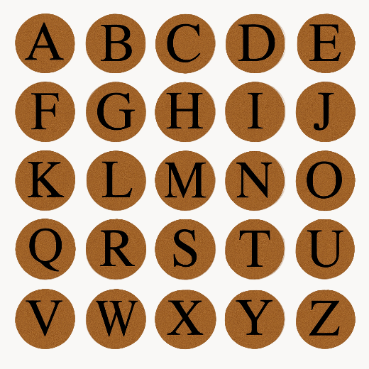 26 round coir doormat inserts, each featuring a bold black serif letter from A to Z on a coir background