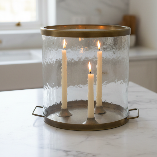 Antique brass and hammered glass triple taper candle holder styled with wicker basket and dried lavender on a white shelf — The Red Hound Gifts