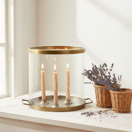 Antique brass and hammered glass triple taper candle holder styled with wicker basket and dried lavender on a white shelf — The Red Hound Gifts