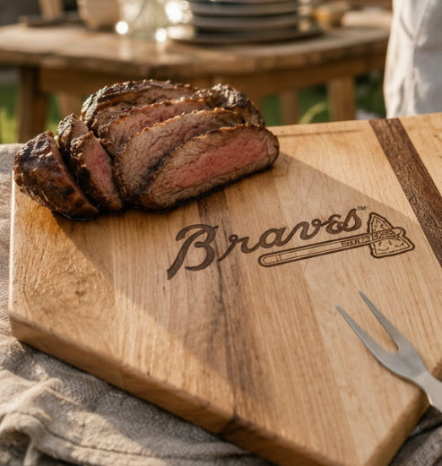 Atlanta Braves-themed BBQ set with cutting board, spatula, fork, bottle opener, and coaster on a white background at The Red Hound Gifts. 