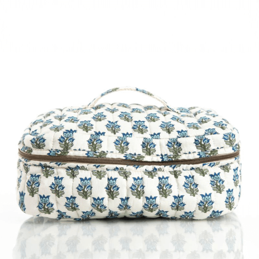 Blue floral-patterned train case travel bag on a white background