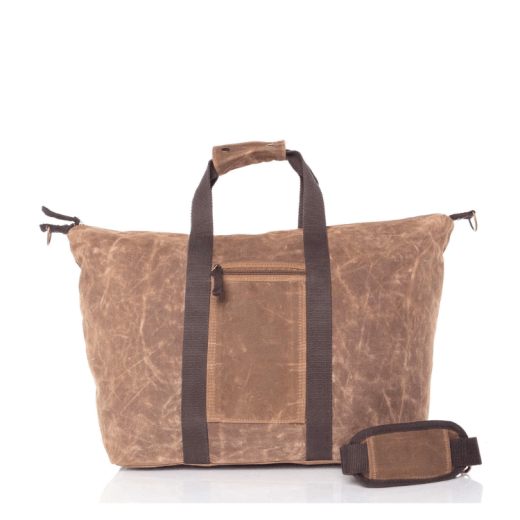 Khakiwaxed canvas bag with brown straps on a white background