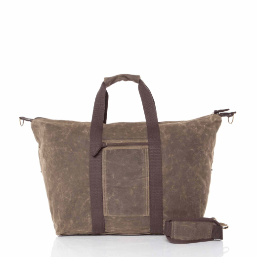 Olive waxed canvas bag with straps on a white background.