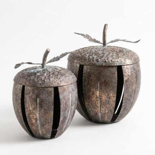 Decorative Woodlands Metal Acorn Set of 2 featuring slat metal frames and detached  lids on a clean white background.