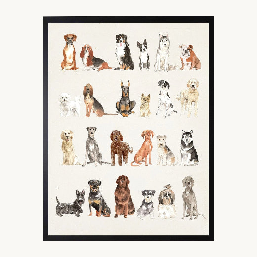 A framed art print featuring a watercolor-style illustration of multiple dog breeds arranged in rows on an off-white background, shown against a light neutral backdrop.