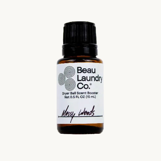 Dryer ball sscent booster bottle on a white background