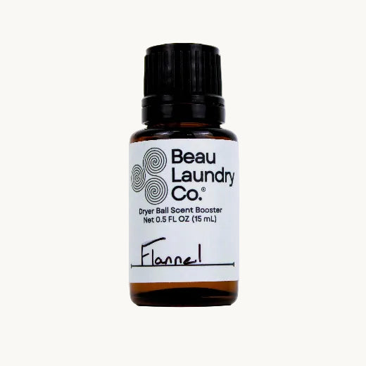 Dryer ball scent booster with 'Flannel' label 