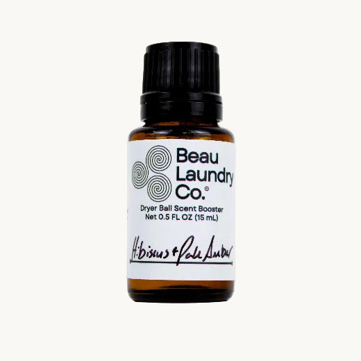 Dryer ball scent booster bottle on a white background