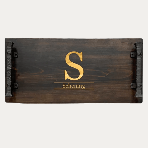 Personalized , engraved charcuterie tray styled on a marble kitchen island with cheese and grapes — custom engraved serving tray from The Red Hound Gifts


