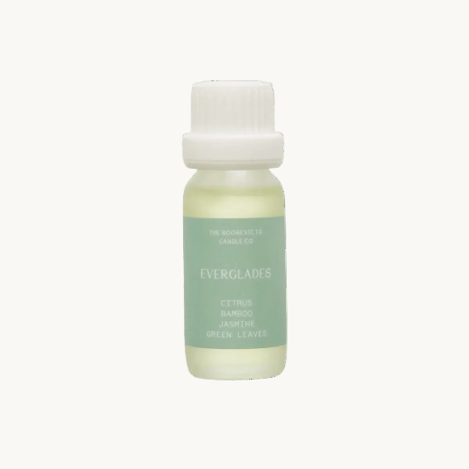 Bottle of Everglades aromatic oil on a white background
