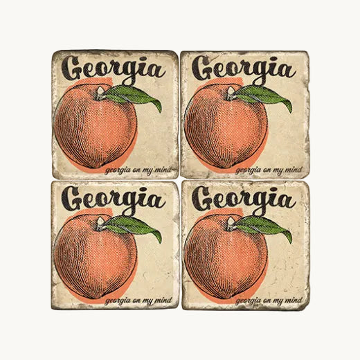 Four individual designer Italian tumbled marble table coasters featuring a vintage Georgia peach illustration, displayed on a clean white background.