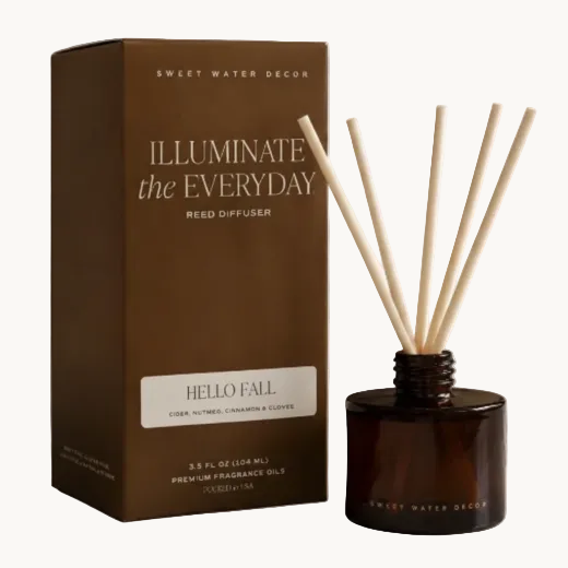 Hello Fall reed diffuser in amber glass jar with dark brown gift box and natural rattan reeds. The Red Hound Gifts.