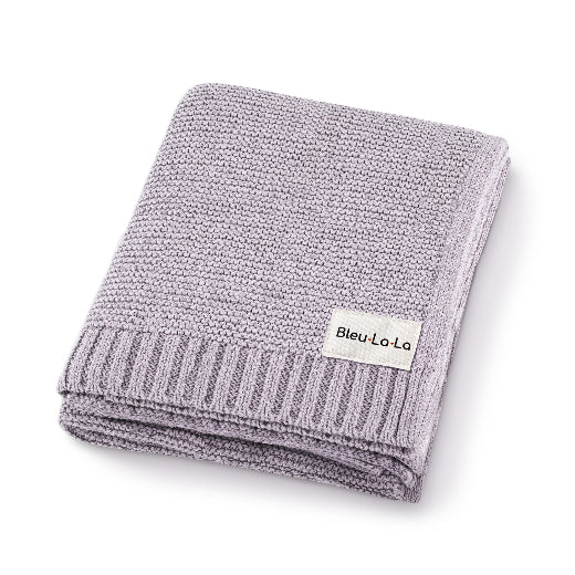 Heritage Cotton Baby Blanket in Natural Oat — organic cotton seed-stitch knit, folded flat, a warm gender-neutral baby shower gift