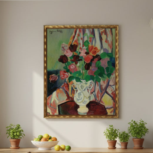 Framed reproduction of an  impressionist oil painting of pink and red blooms in a decorative white urn vase.