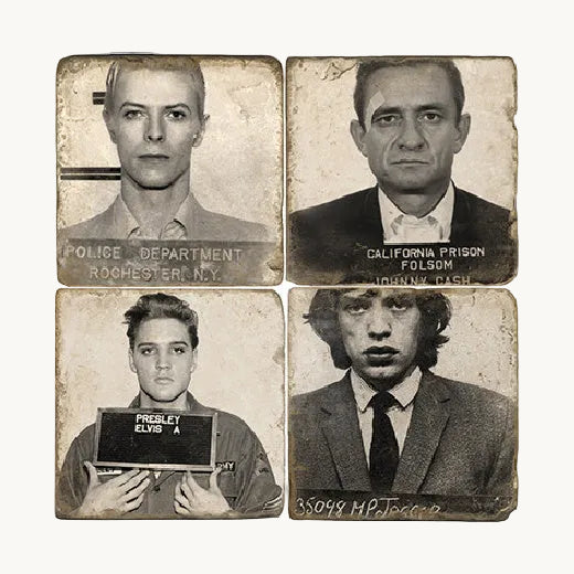 Set of four Italian tumbled marble coasters featuring vintage mugshot portraits of David Bowie, Johnny Cash, Elvis Presley, and Mick Jagger arranged in a grid. The Red Hound Gifts.