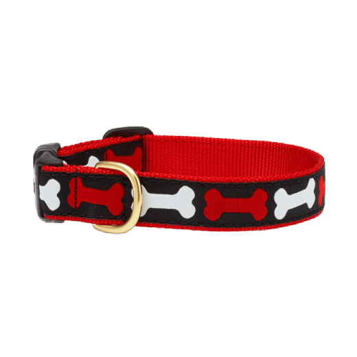 Dog collar with red and white bone pattern on a black background