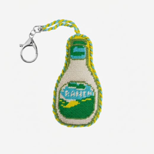 Needlepoint ranch dressing bottle bag charm in green and yellow with multicolor rope trim and gold tone clasp