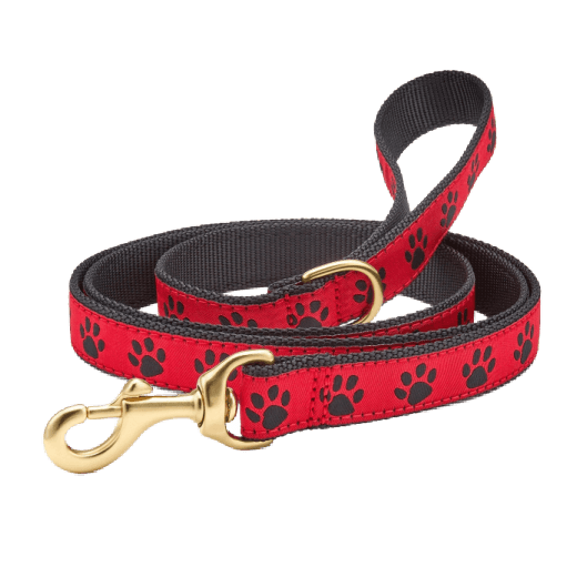 Red dog leash with black paw prints 