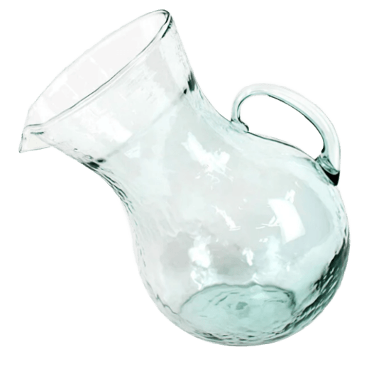 Tilted Glass Pitcher on Patio Table