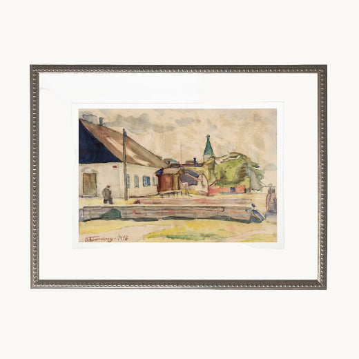 Vintage watercolor European village scene matted and framed in silver — farmhouse, church spire, and figures in warm earthy tones. The Red Hound Gifts.