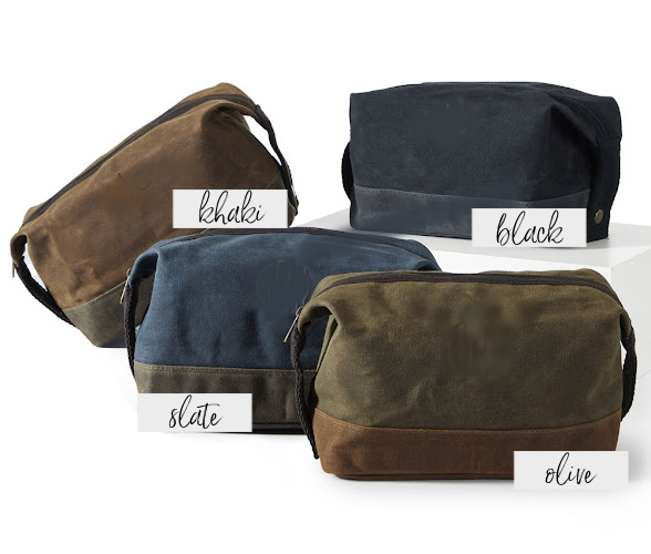 Brown waxed canvas toiletry bag on a white background