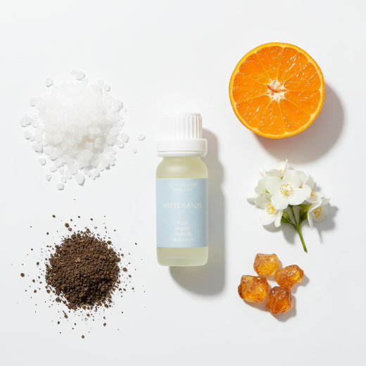 Small diffuser oil bottle labeled 'White Sands' on a white background