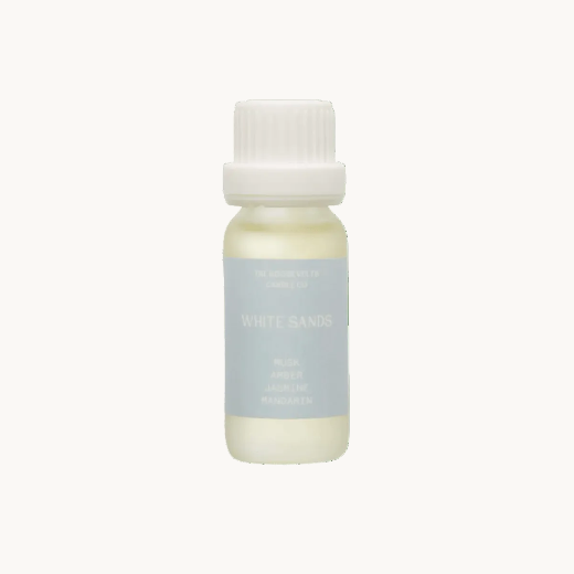 Small diffuser oil bottle labeled 'White Sands' on a white background