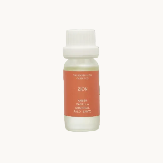 Bottle of 'Zion' diffuser oil on a white background